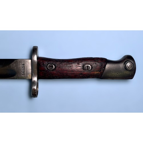 561 - A Belgian SA30 bayonet with 225mm double-edged blacked steel blade, wooden grips and black metal sca... 