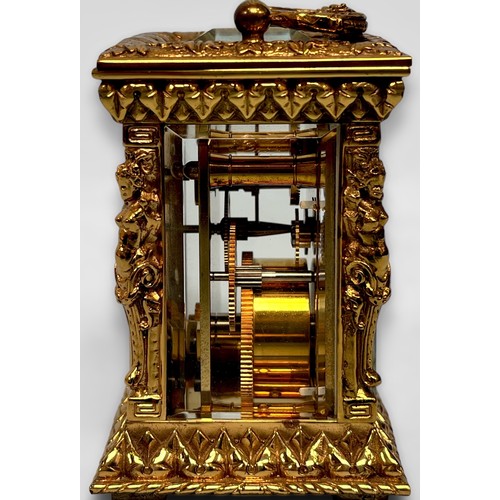 377 - An ornately decorated brass-cased carriage clock by Charles Frodsham & Co, London, cast caryatid pil... 