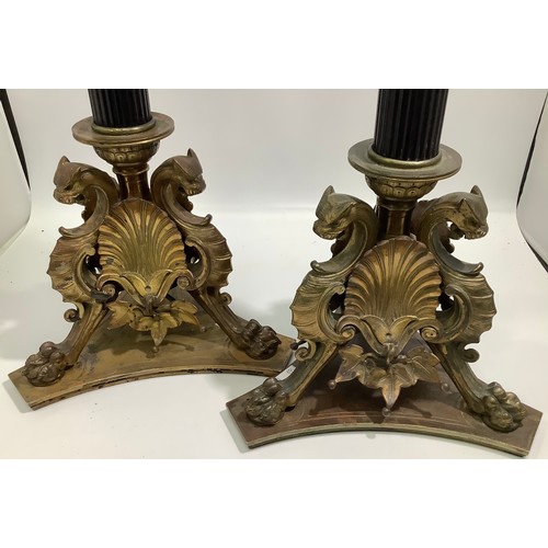 69 - A pair of early 20th Century Elkington Baroque style table lamps, modelled as fluted black columns t... 