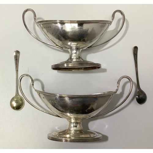 74 - A matched pair of Victorian silver salts by William Hutton & Sons, of oval/trophy form with with twi... 