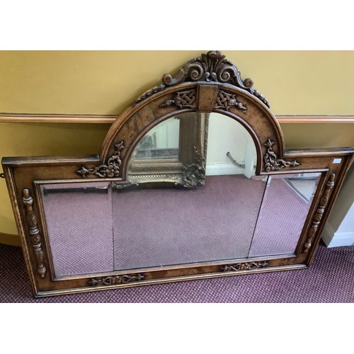 388 - A 19th century oak overmantle mirror, possibly previously the back to a sideboard, with central arch... 