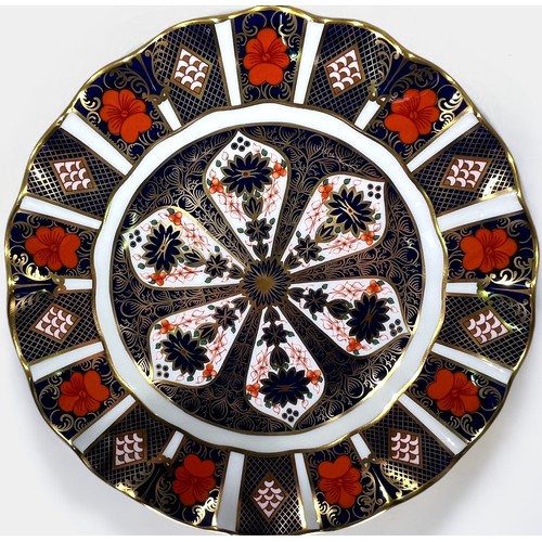 29 - Four Royal Crown Derby Old Imari, pattern 1128 items comprising a circular plate, a two-handled dish... 