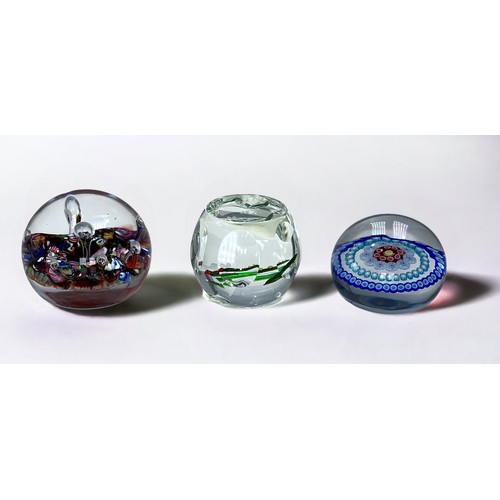 33 - A 19th Century Baccarat crystal paperweight, of domed form, concentric patterned millefiori design, ... 