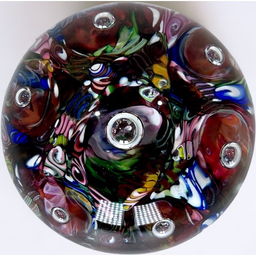 33 - A 19th Century Baccarat crystal paperweight, of domed form, concentric patterned millefiori design, ... 