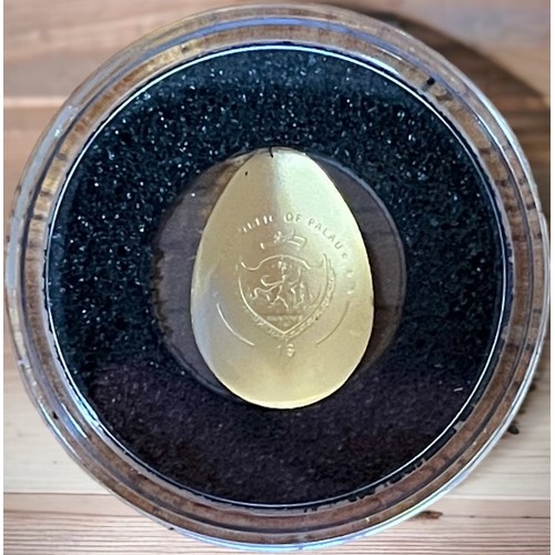 258 - A Republic of Palau 1 Dollar 'Golden Egg No.1' 0.5g, 9999/10000 Au, of convex egg form, Obv. with Po... 