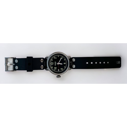 129 - A gents Nixon ‘The October’ quartz wristwatch, the black enamel dial with alternating Arabic numeral... 