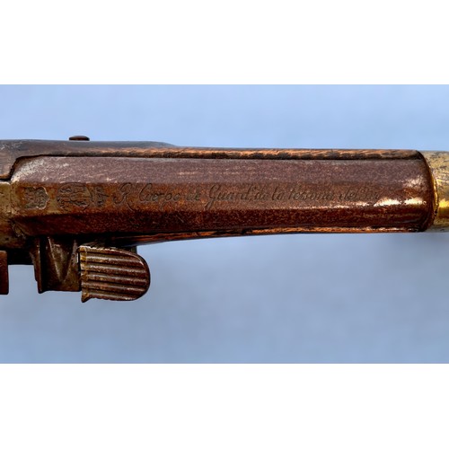 593 - A replica Miquelet military design Spanish single bore flintlock pistol, the top of the barrel marke... 