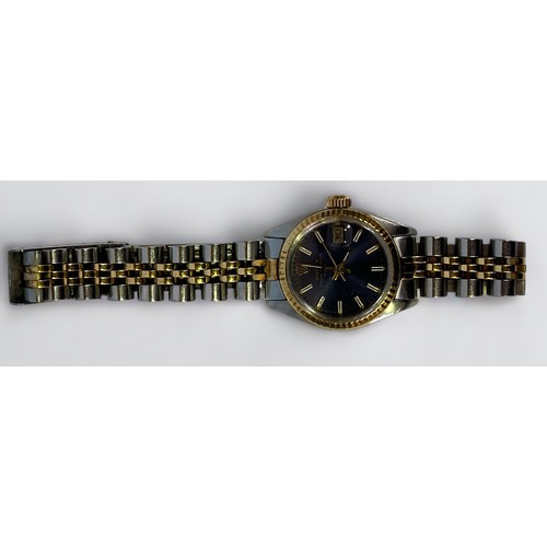 135 - A ladies Rolex ‘Rolesor’ Oyster Perpetual Date wristwatch, model 6917, C.1979 the blue dial with bat... 