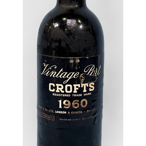 710 - One bottle of Crofts Vintage Port, 1960, tear to label, level appears high shoulder