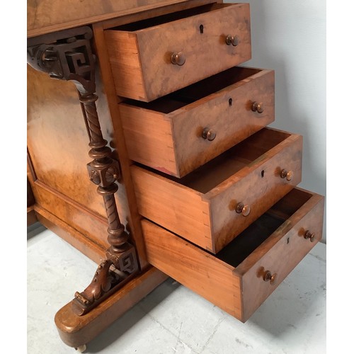 419 - A Victorian walnut veneered Davenport desk, with secret button to operate the rising stationary comp... 