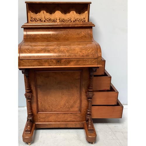 419 - A Victorian walnut veneered Davenport desk, with secret button to operate the rising stationary comp... 