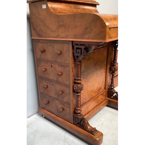 419 - A Victorian walnut veneered Davenport desk, with secret button to operate the rising stationary comp... 