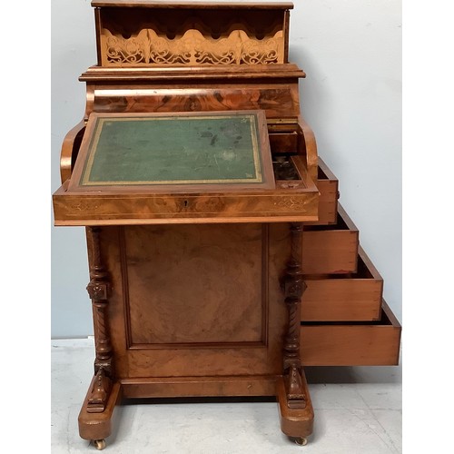 419 - A Victorian walnut veneered Davenport desk, with secret button to operate the rising stationary comp... 