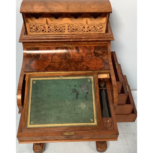 419 - A Victorian walnut veneered Davenport desk, with secret button to operate the rising stationary comp... 