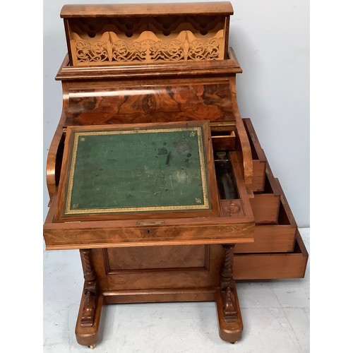 419 - A Victorian walnut veneered Davenport desk, with secret button to operate the rising stationary comp... 