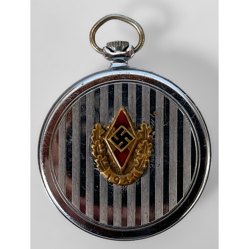 620 - A white metal open-face pocket watch bearing WW2 Third Reich enamel badge, in protective hinged bras... 