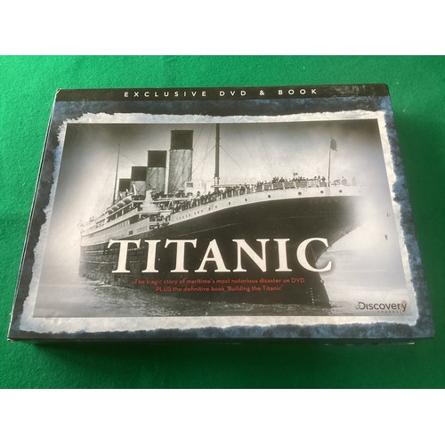 264 - Collectables relating to the sinking of the Titanic – a commemorative cover, postcards and collector... 