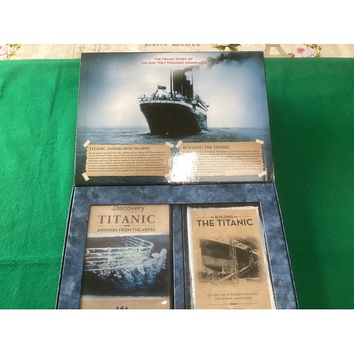 264 - Collectables relating to the sinking of the Titanic – a commemorative cover, postcards and collector... 