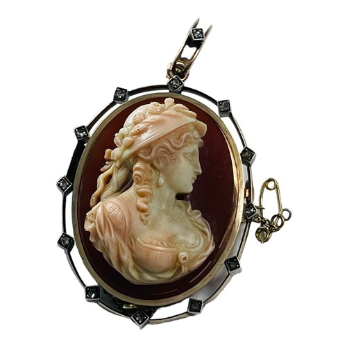 207 - A French Victorian hardstone carved cameo brooch, set with a cameo of a woman's head and bust, carve... 