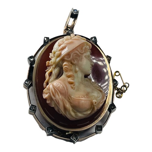 207 - A French Victorian hardstone carved cameo brooch, set with a cameo of a woman's head and bust, carve... 