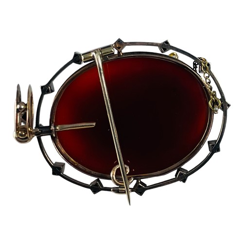 207 - A French Victorian hardstone carved cameo brooch, set with a cameo of a woman's head and bust, carve... 