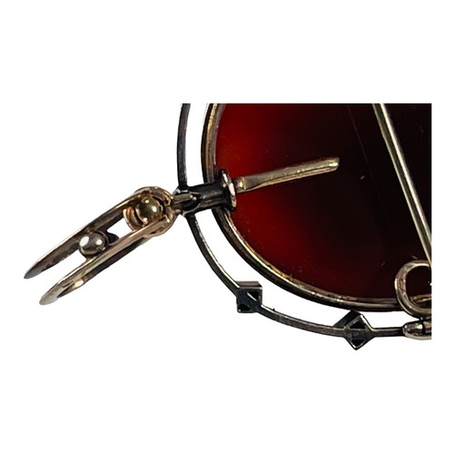 207 - A French Victorian hardstone carved cameo brooch, set with a cameo of a woman's head and bust, carve... 