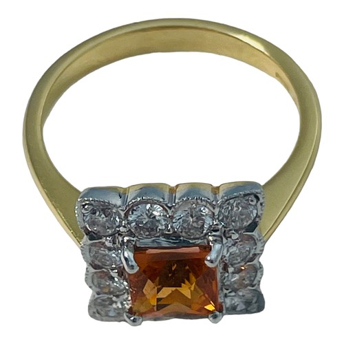 189 - An 18ct yellow gold tangerine spessartite garnet and diamond cluster ring, claw set with a central s... 