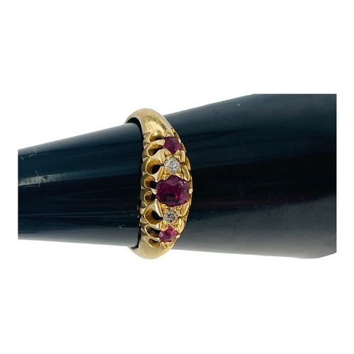 204 - An 18ct yellow gold dress ring, set with 3 x faceted rubies, and 2 x old cut diamonds, in a gypsy st... 