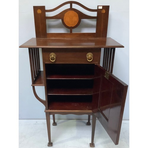 412 - An Art Nouveau mahogany small standing cabinet/music cabinet, the top with raised and pierced back, ... 