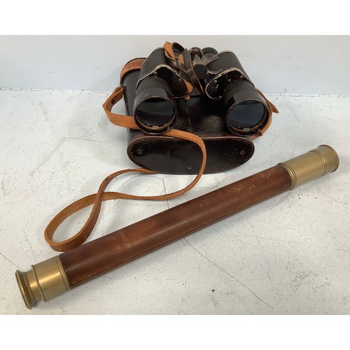 668 - A single-draw telescope by Ross, London, No. 66473, nickel and leather bound tube, with lens cap, st... 