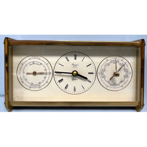 380 - An early 20th Century brass anniversary clock raised on two pillars with glass dome (af), together w... 