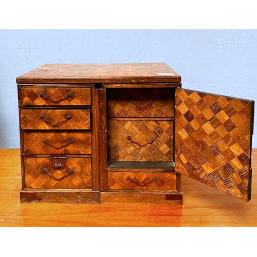 340 - A 19th century Japanese parquetry and metal mounted travelling scholars' chest, with removable recta... 