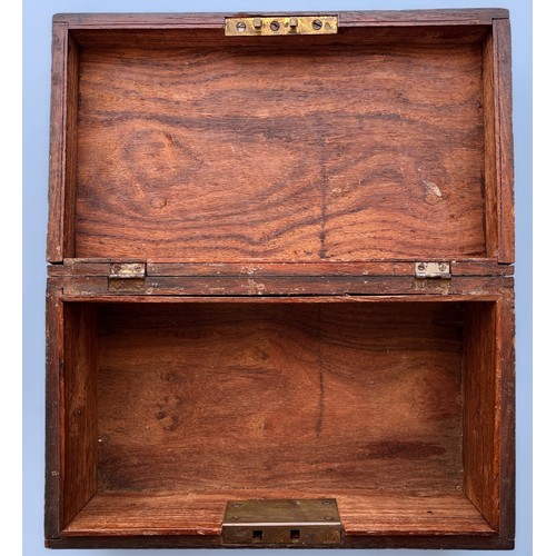 689 - A small stained oak jewellery box with foliate decoration throughout and The Queen’s Royal Regiment ... 