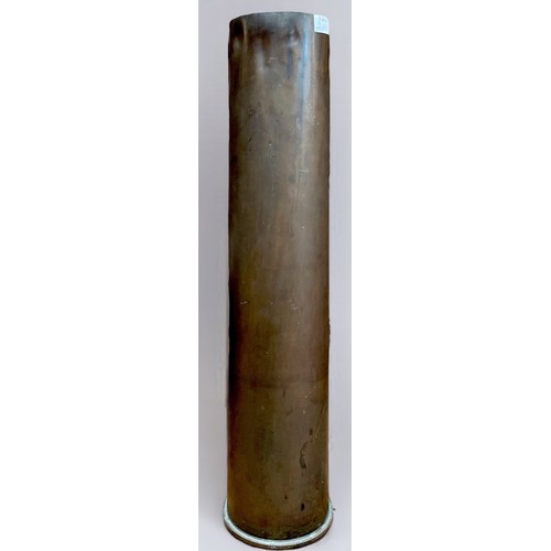 686 - A large brass shell case, 68cm tall and a photograph of HMS Queen Elizabeth taken at Portsmouth Harb... 