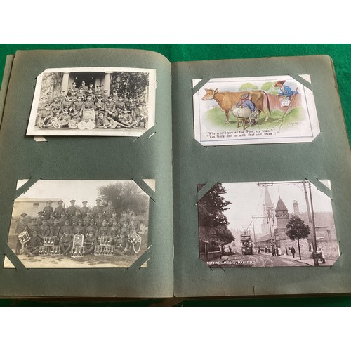 262 - An album containing approximately 285 standard-size postcards, which are mainly English topographica... 