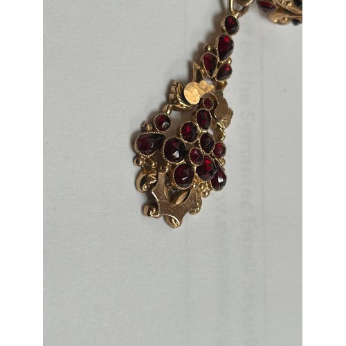 184 - A pair of 19th century gold, (possibly 15ct) Late Georgian drop earrings, set with rose-cut garnets,... 