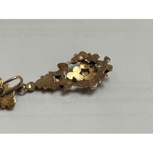 184 - A pair of 19th century gold, (possibly 15ct) Late Georgian drop earrings, set with rose-cut garnets,... 