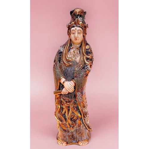 56 - A large 20th century Japanese Satsuma pottery figure of Guanyin or Kannon, the female goddess standi... 