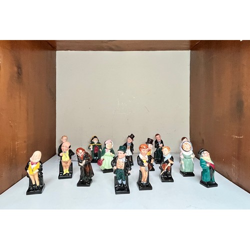 10 - A collection of fifteen small Royal Doulton Dickensian figures, comprising, ‘Oliver Twist’, ‘Fagin’,... 