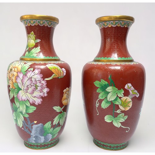 50 - A Pair of early 20th century Japanese Cloisonne vases, decorated with flowers and butterflies to an ... 