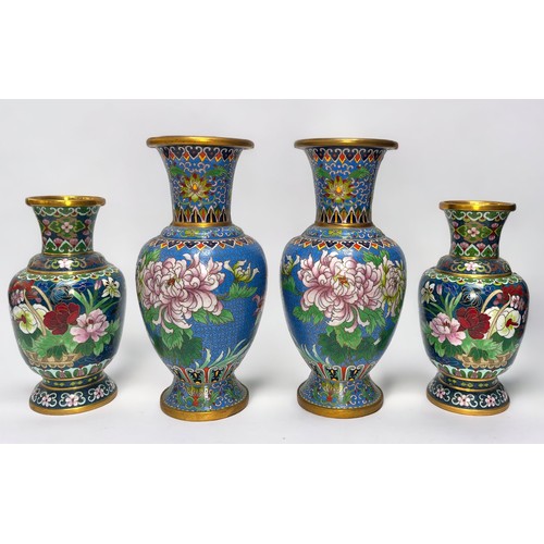 58 - Two various pairs of Chinese cloisonne enamel vases, decorated with polychrome flowers and cloud ban... 