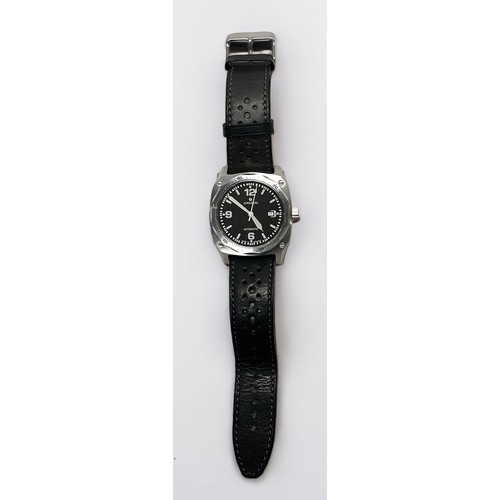 95 - A gents stainless steel automatic wristwatch by Junghan, the black enamel dial with batons denoting ... 