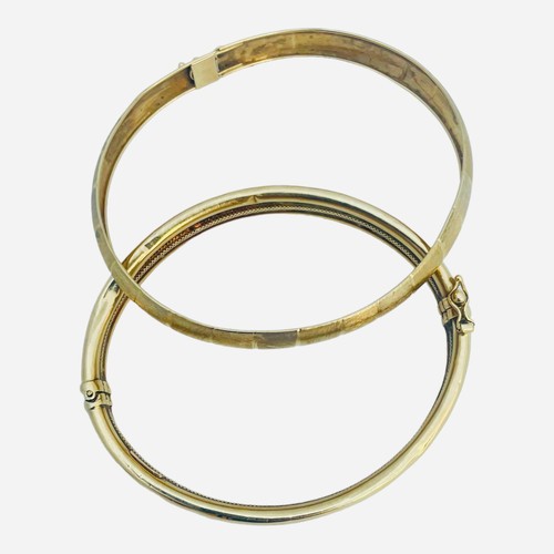 143 - Two various 9ct gold bangles, both hallmarked, 13.4 grams.