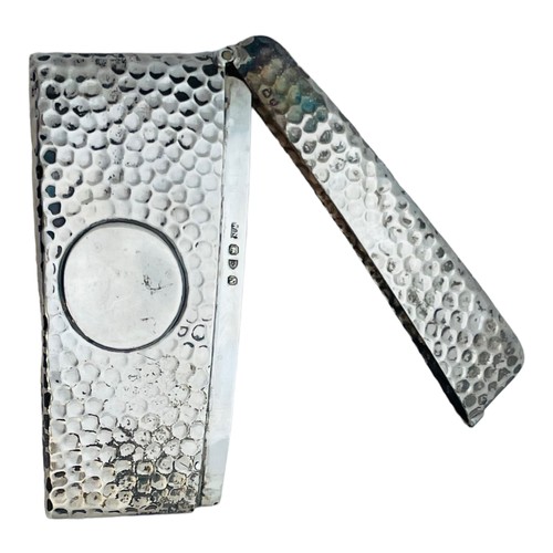 151 - A silver case, hammered design, with blank circle to the centre, hallmarked Chester 1896, weighs 50.... 