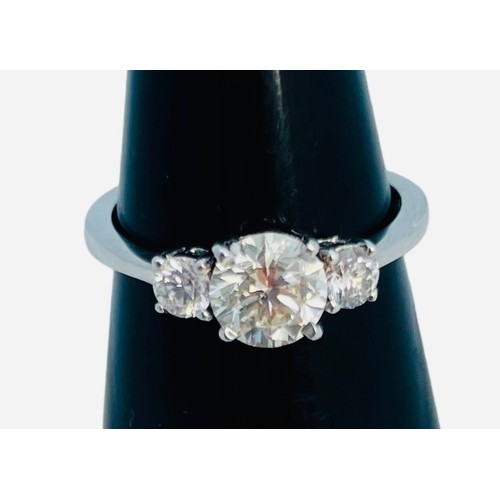 157 - An 18ct white gold ring, set with a central round brilliant cut diamond, estimated weight 1.00cts, w... 