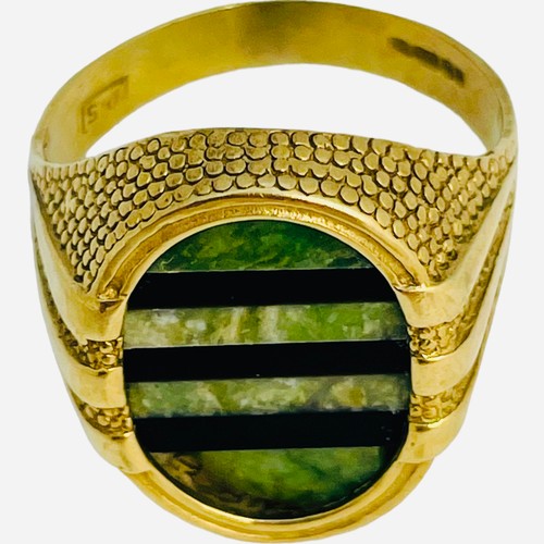 171 - A 9ct ring, set with an oval hardstone of green and black striped design, 7.3 grams gross.