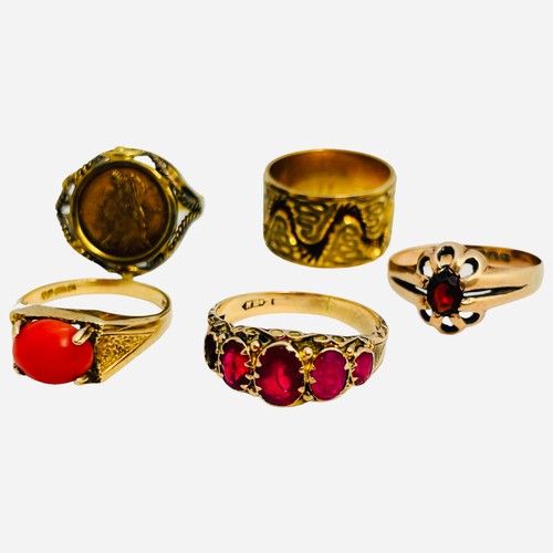 174 - A 9ct gold wedding ring of wave design, a 9ct gold ring set with a small coin, a 9ct gold coral ring... 