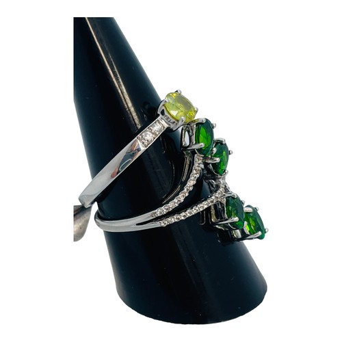 186 - Two 9ct white gold dress rings, set with green and white stones, total weight 5.0 grams.