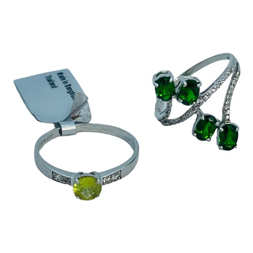 186 - Two 9ct white gold dress rings, set with green and white stones, total weight 5.0 grams.