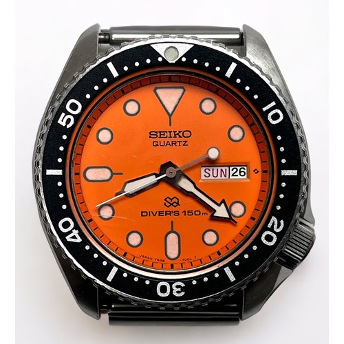 96 - A vintage Seiko Quartz SQ Divers 150m stainless steel wristwatch, the orange enamel dial with dot ma... 